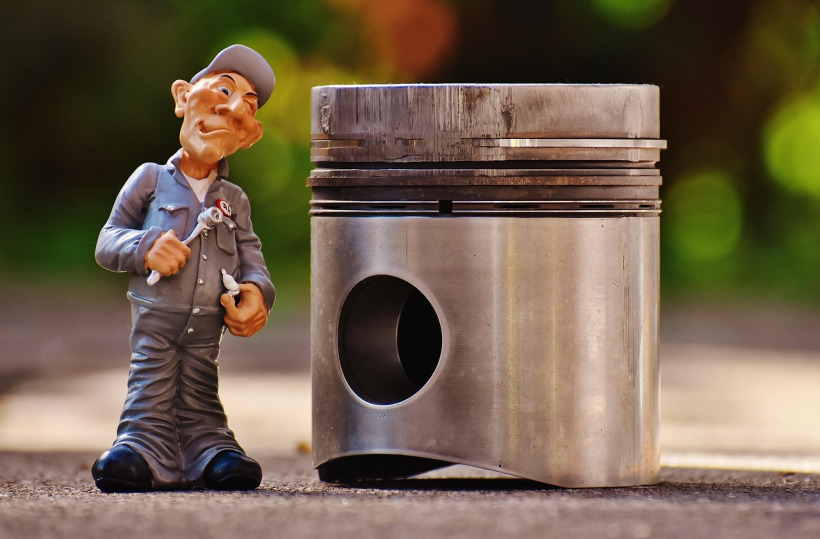 mechanic inspecting parts