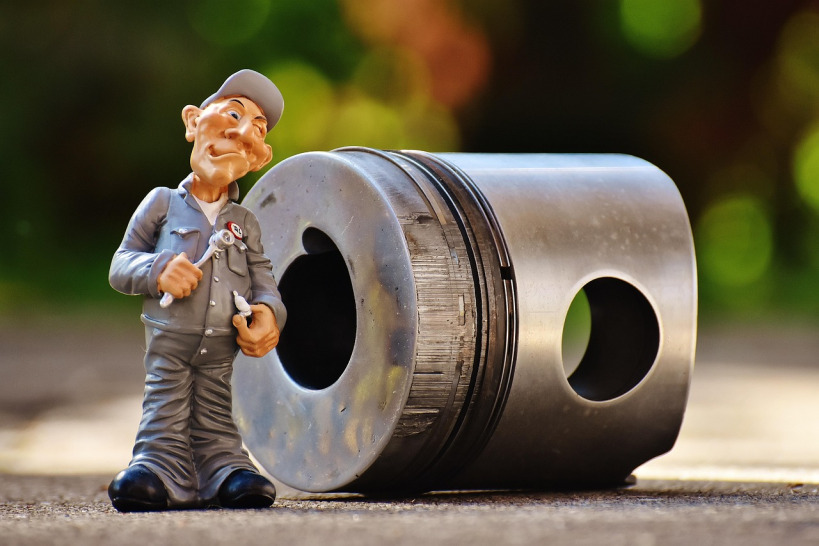 mechanic inspecting parts